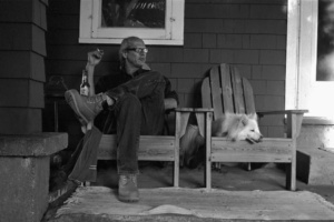 Tom Bintz and Otto on their back porch; Algoma, WI 2010; © 2022 Jason Houge, All Rights Reserved; Algoma_060