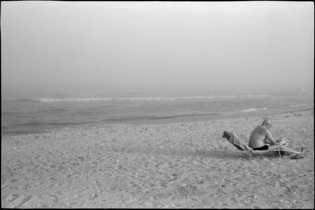 Sunbathing in Lake Michigan's fog; Crescent Beach, Algoma, WI 2010; © 2022 Jason Houge, All Rights Reserved; Algoma_067
