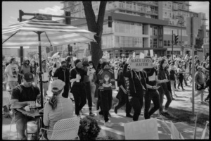 Black Lives Matter march passing a dining couple; Madison, WI 2020; © 2022 Jason Houge, All Rights Reserved; In_The_Air_Tonight_018