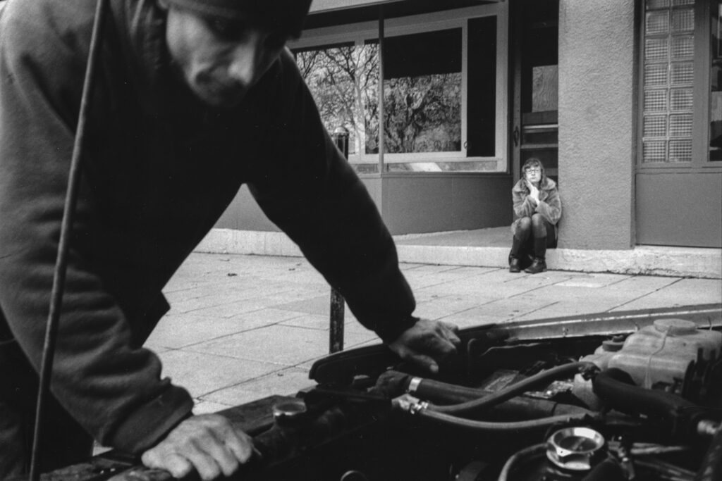 Kayla waits as our friend Mike and I try to fix our car; Green Bay, WI 2015; © 2015 Jason Houge, All Rights Reserved; JH_Reconciliation_08
