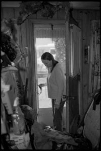 Lisa in the entry of her father's home; Menominee, MI 2018; © 2018 Jason Houge, All Rights Reserved; JH_Reconciliation_12