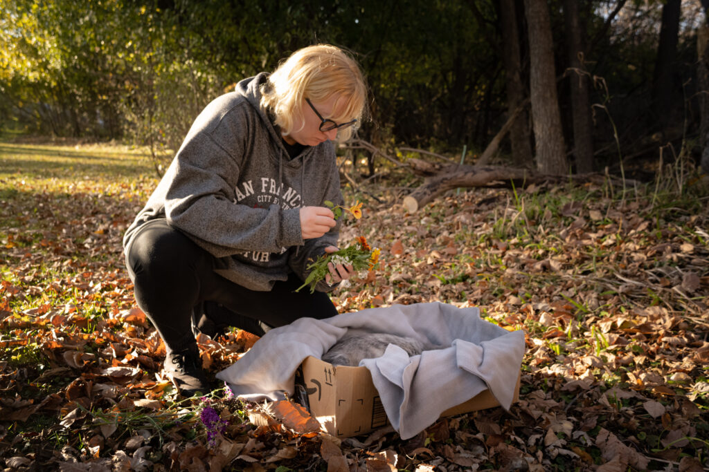 Deep Blue: Kayla Collecting Flowers For Ansel's Burial © 2022 Jason Houge, All Rights Reserved